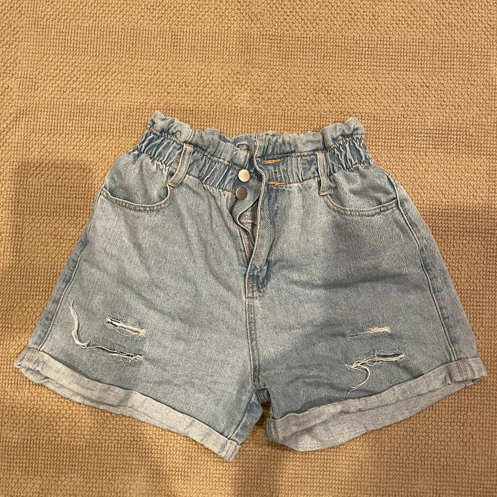 Distressed paper bag shorts